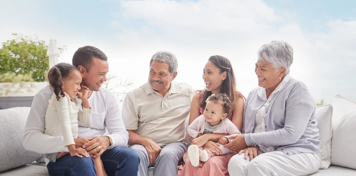 Multi-generational Florida family gathered together, symbolizing legacy and estate planning.